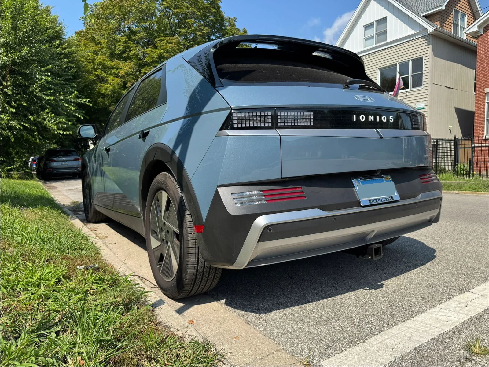 Installed EcoHitch receiver below the rear bumper of the Ioniq 5